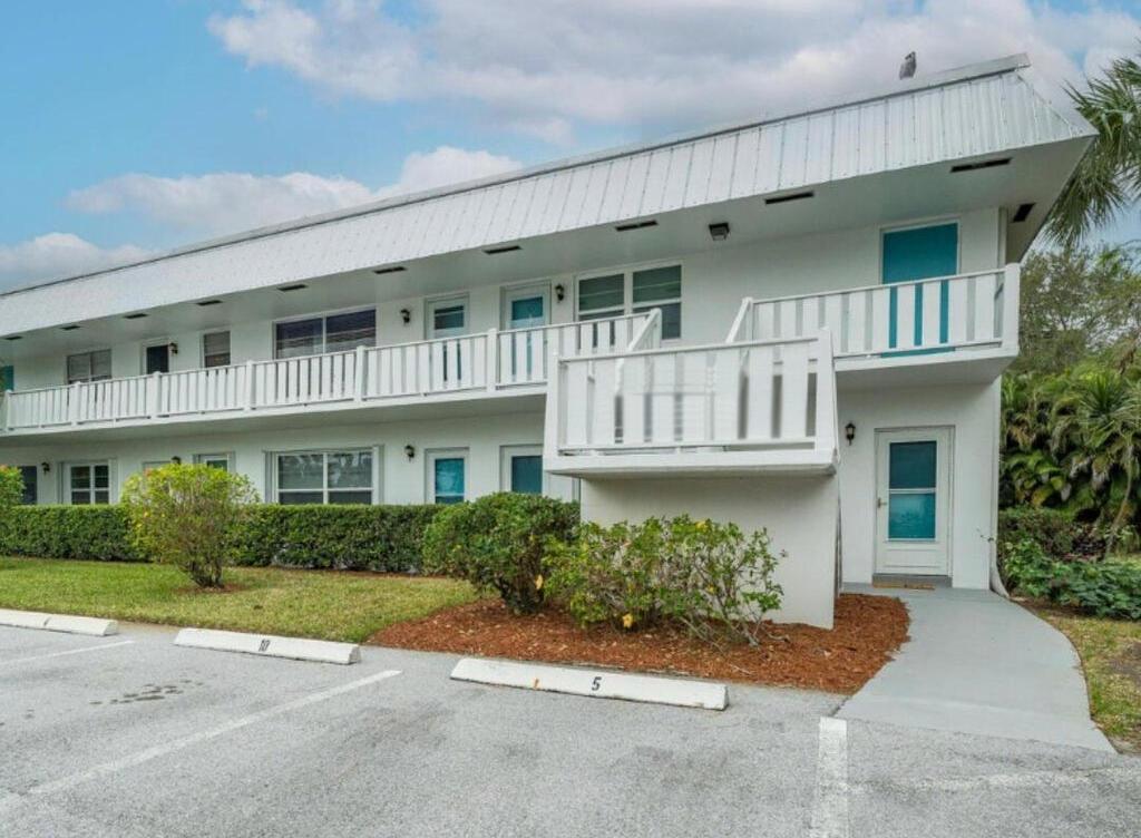 Lovingly cared for 2 bedrooms, 2 baths, updated unit with an enclosed porch opening to a very private back yard. Clubhouse and community pool. Just steps from shopping, stores and offices. Convenient to downtown Stuart and the beach.Partially furnished, can be rented unfurnished or completely furnished.