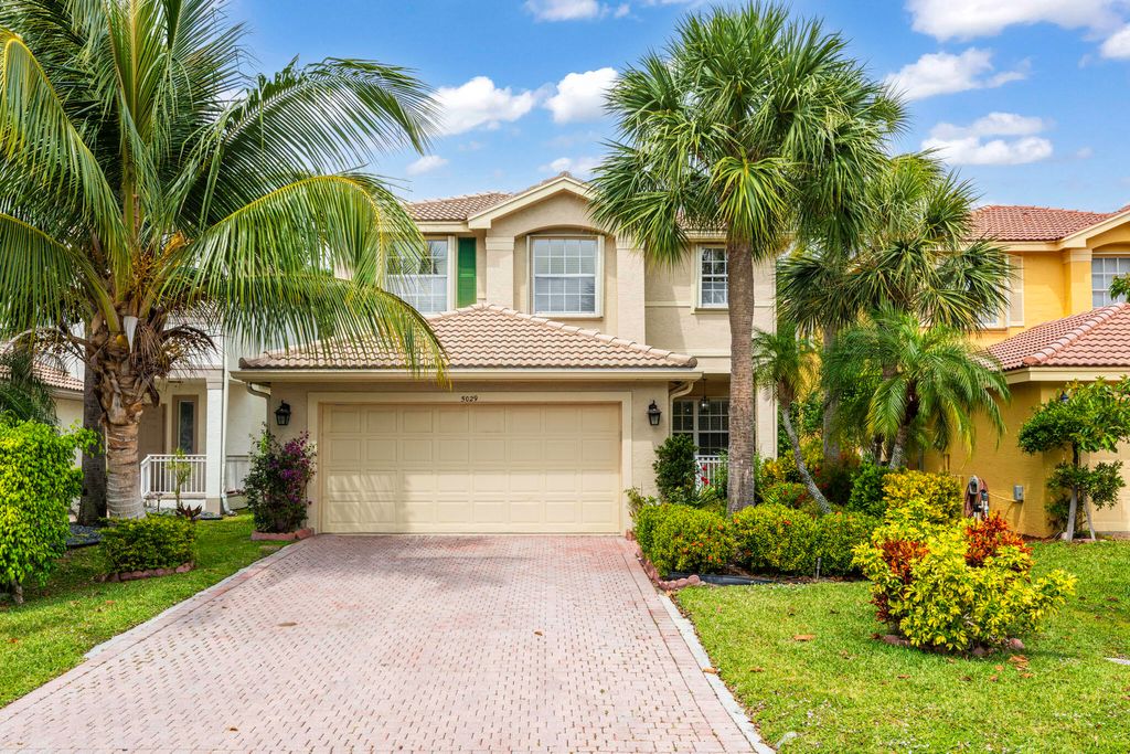 Photo of 5029 Starblaze Drive, Greenacres, FL 33463 (MLS # R11075330)