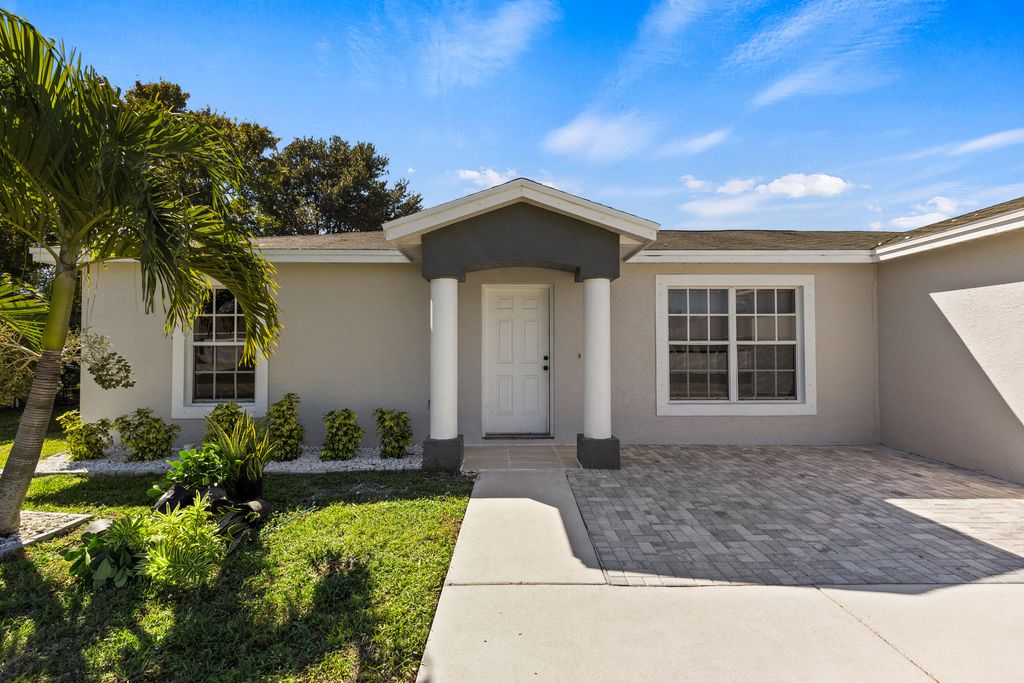 Photo of 2110 SW Trenton Lane, Port Saint Lucie, FL 34984 (MLS # R11137440)