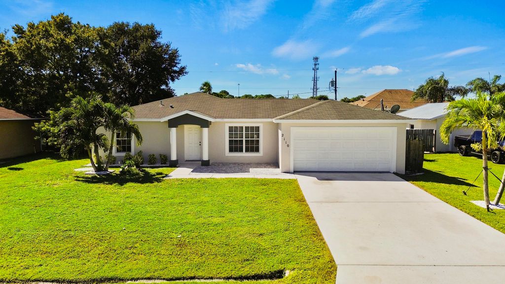 Photo of 2110 SW Trenton Lane, Port Saint Lucie, FL 34984 (MLS # R11137440)