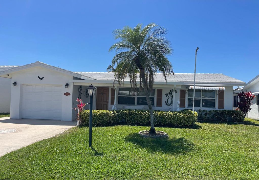 Photo of 1313 SW Lake Court, Boynton Beach, FL 33426 (MLS # R11083944)