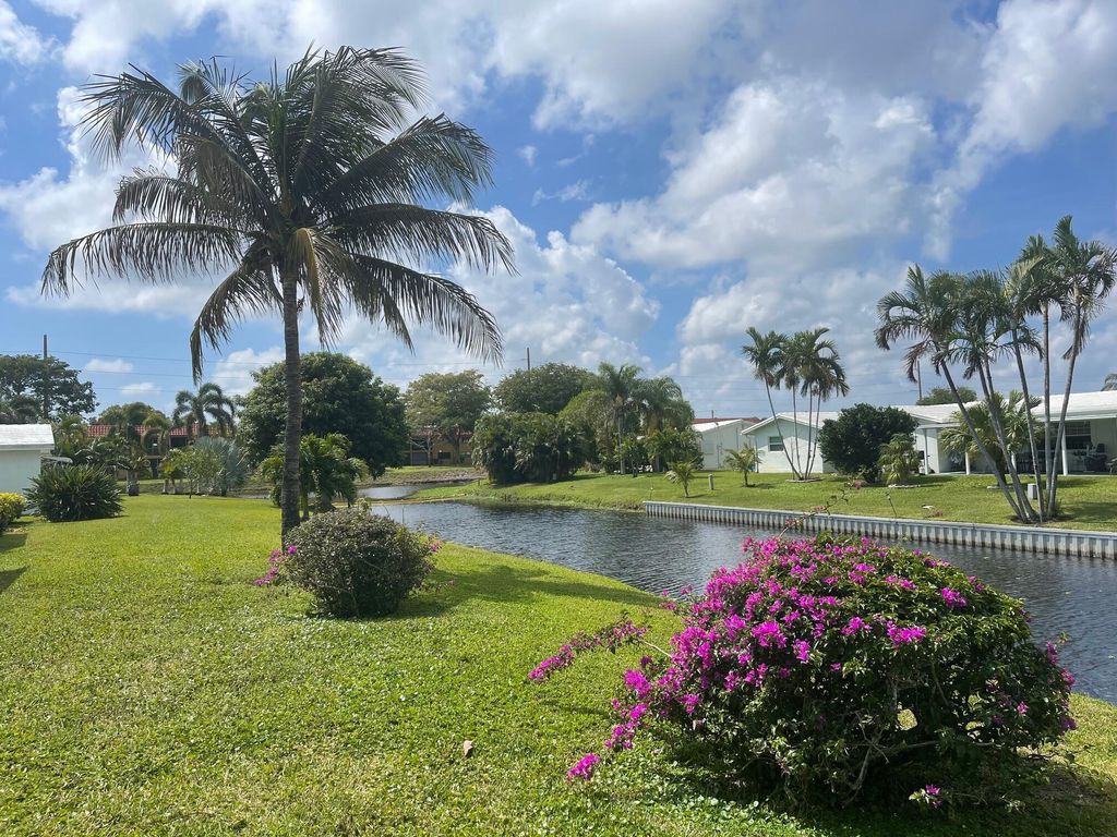 Photo of 1313 SW Lake Court, Boynton Beach, FL 33426 (MLS # R11083944)