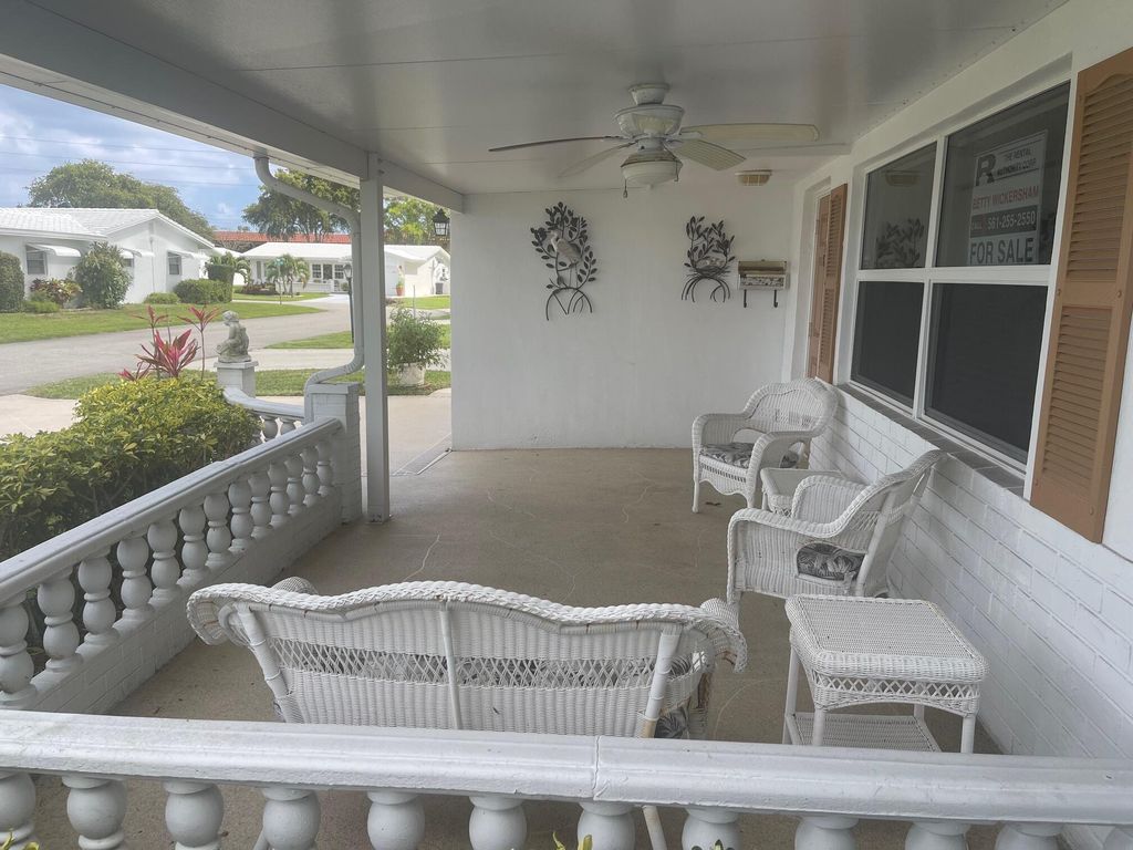 Photo of 1313 SW Lake Court, Boynton Beach, FL 33426 (MLS # R11083944)