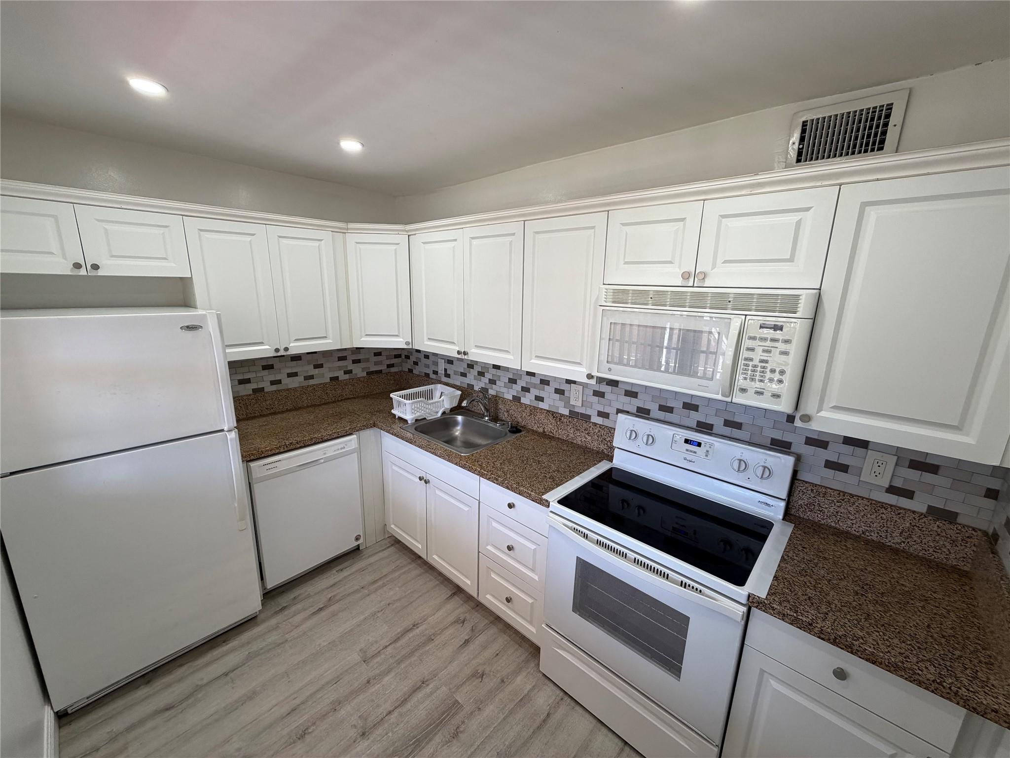 Coral Gardens Condo - Residential Lease