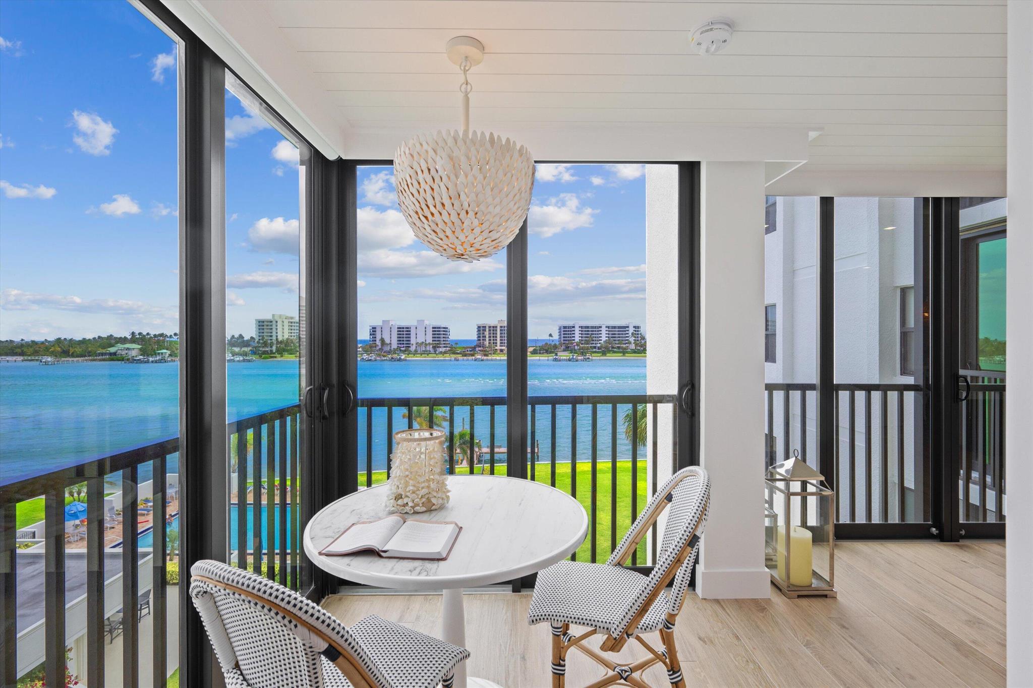 Offered as an annual or seasonal rental! Newly renovated to perfection with spectacular panoramic views of the blue water on the Intracoastal and ocean! This unit offers beautiful new porcelain floors throughout, new kitchen that was opened up and flows into the great room that overlooks the Intracoastal. Other notable features are raised ceilings, shiplap, all new impact sliders and windows, new wetbar, split floorplan with 2 master suites and an oversized walk in closet, luxurious bathrooms, all new doors and hardware and impeccable decor and furnishings! Sandpointe Bay is in the heart of Tequesta directly on the Intracoastal that offers wonderful of amenities, including heated resort type pool directly overlooking the Intracoastal and Day, clubhouse, sauna, tennis, SEE MORE...