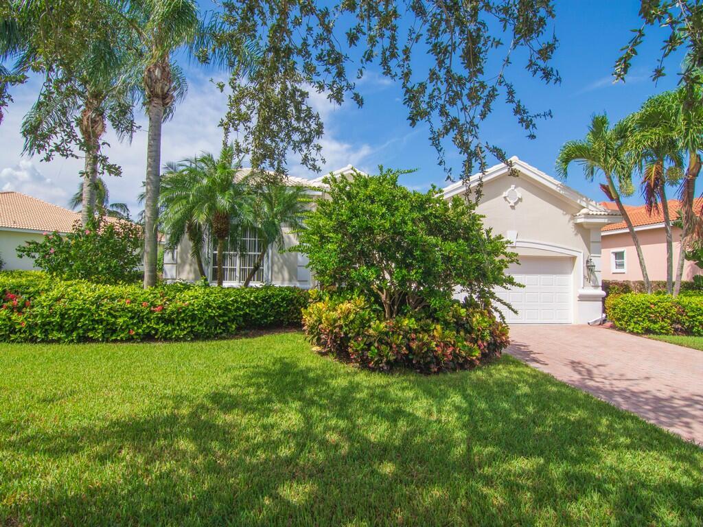 Lakefront 3BR/ 3BA in gated community with beach access. Open floor plan, high ceilings, updated primary bath and turnkey condition. Enjoy screened pool, spa and beautifully landscaped yard. Florida living at its finest. Don't miss this move in-ready gem!
