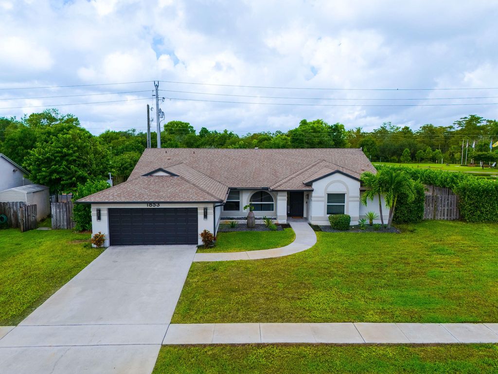 Photo of 1853 Shower Tree Way, Wellington, FL 33414 (MLS # B26005917)