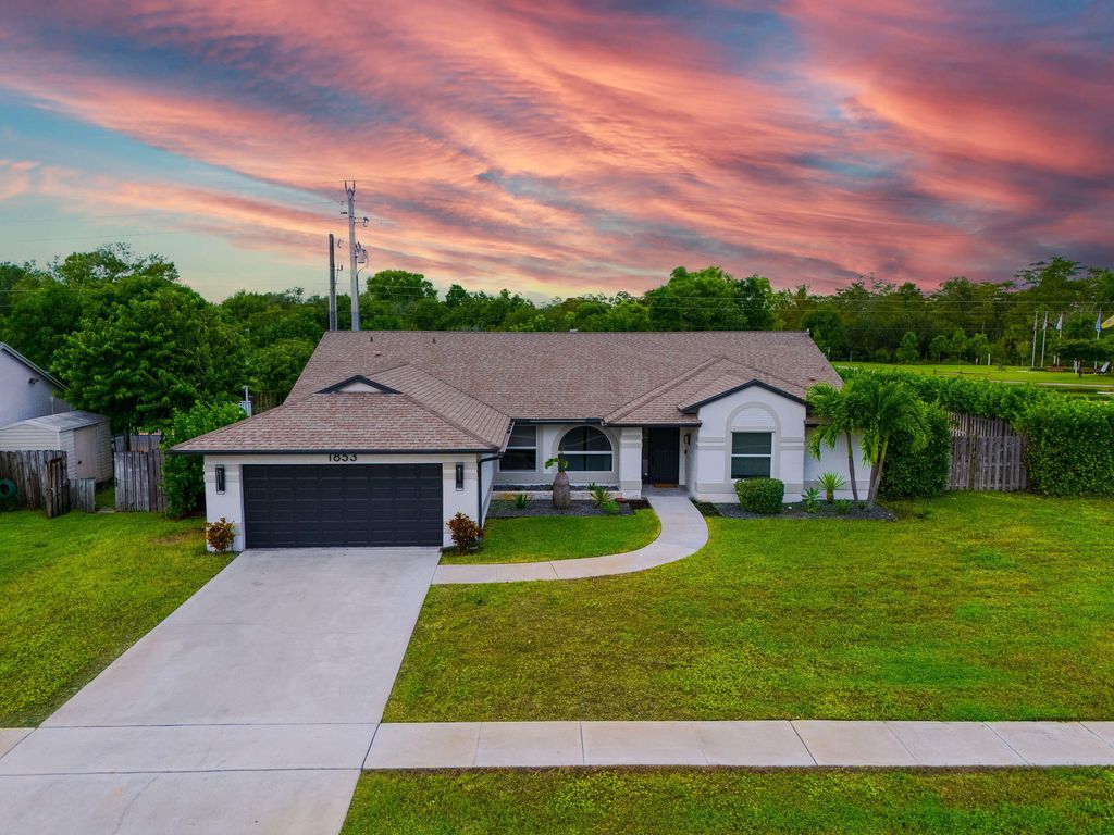 Photo of 1853 Shower Tree Way, Wellington, FL 33414 (MLS # B26005917)