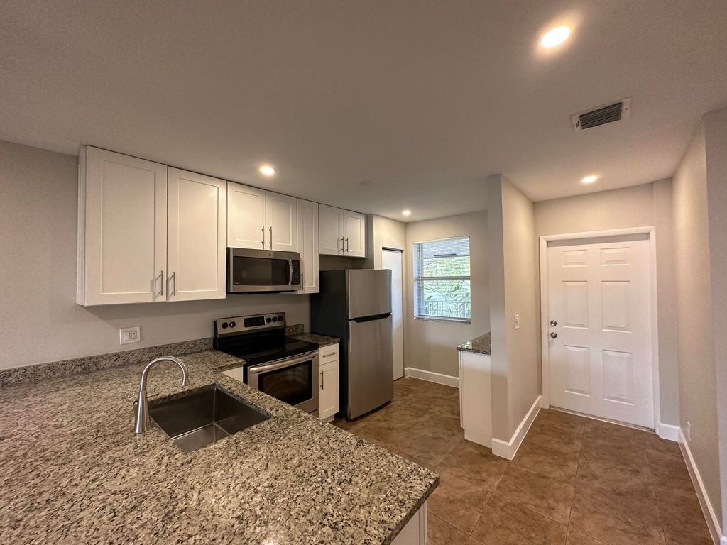 Photo of 2109 SE 3rd Street #C, Boynton Beach, FL 33435 (MLS # R11069177)