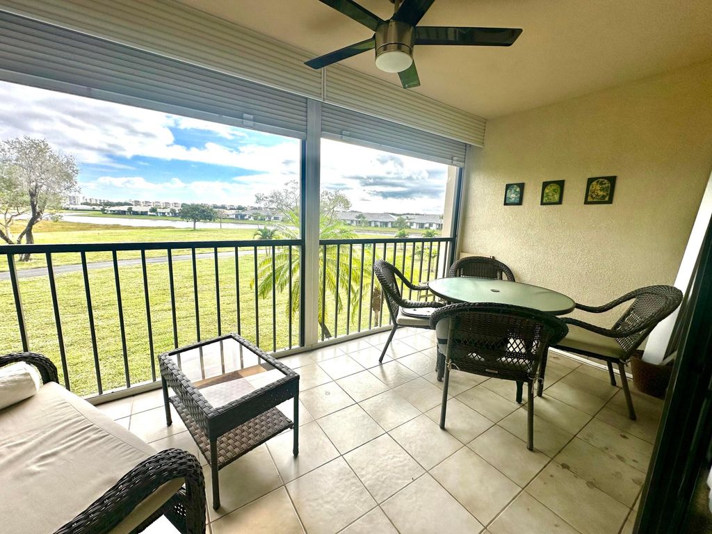 Photo of 14426 Amberly Lane #203, Delray Beach, FL 33446 (MLS # R11154637)