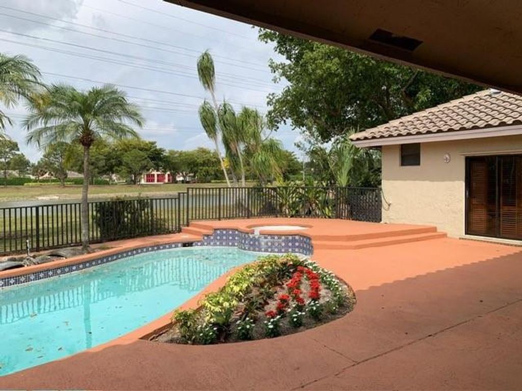 Photo of 6797 NW 44th Court, Coral Springs, FL 33067 (MLS # F10491474)