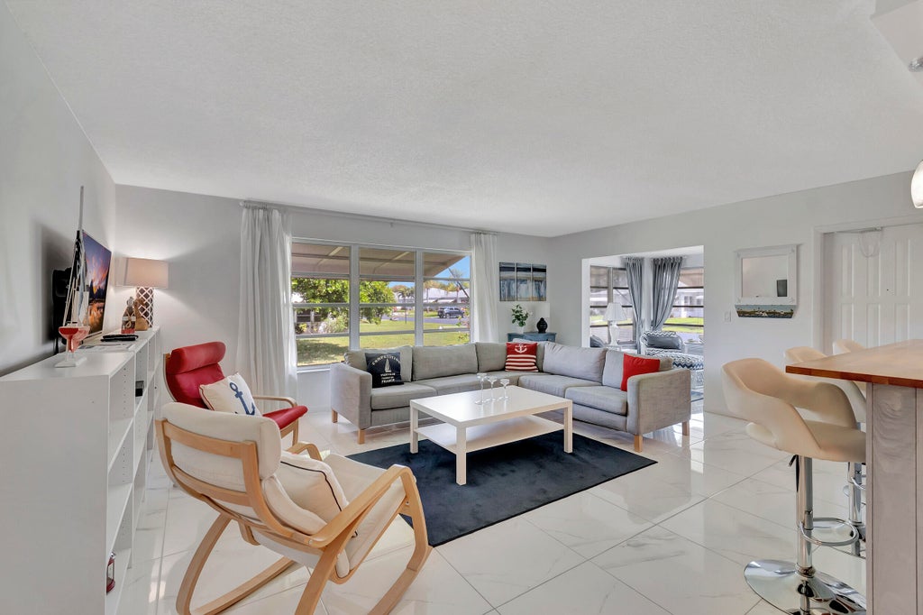 Photo of 1182 S DRIVE Circle #D, Delray Beach, FL 33445 (MLS # B26080714)