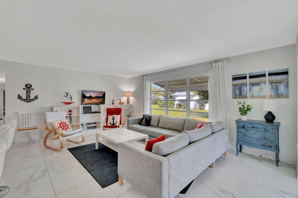 Photo of 1182 S DRIVE Circle #D, Delray Beach, FL 33445 (MLS # B26080714)