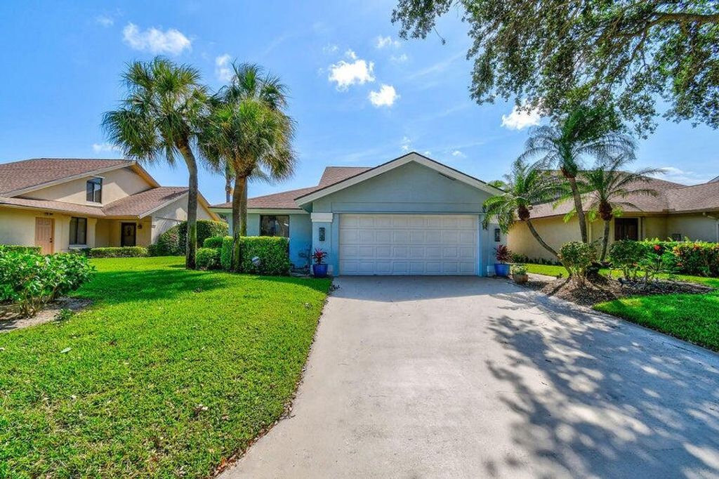 Photo of 112 Sand Pine Drive, Jupiter, FL 33477 (MLS # R10976333)