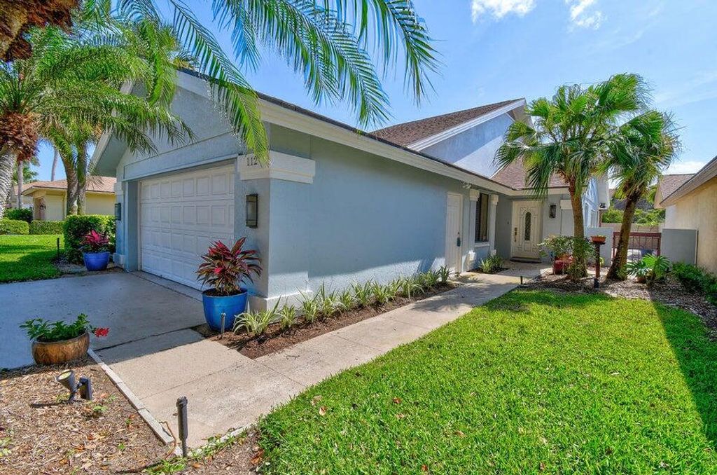 Photo of 112 Sand Pine Drive, Jupiter, FL 33477 (MLS # R10976333)