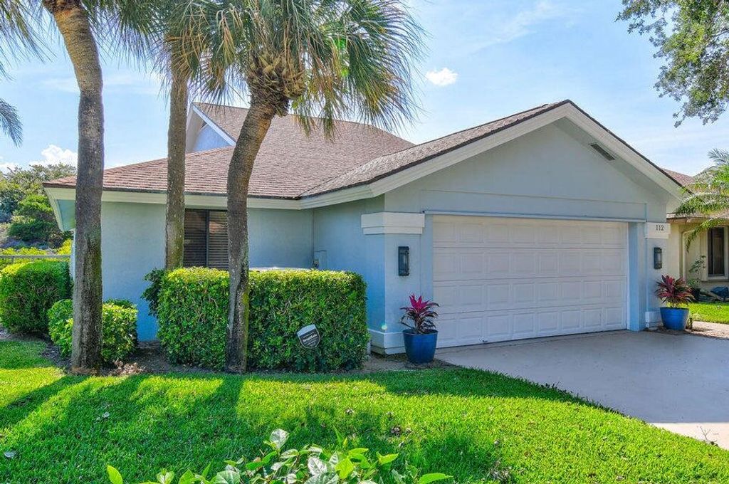 Photo of 112 Sand Pine Drive, Jupiter, FL 33477 (MLS # R10976333)