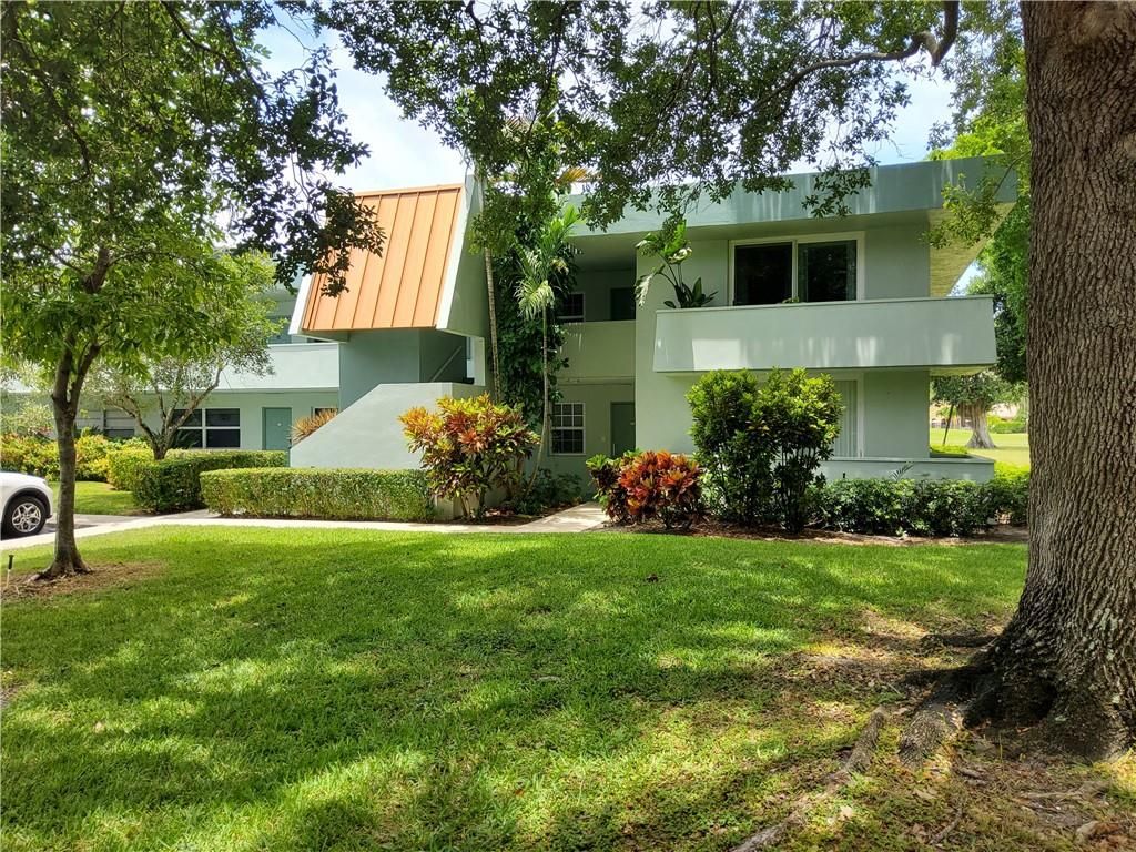 Photo of 901 Cypress Grove Dr #201, Pompano Beach, FL 33069 (MLS # F10286174)