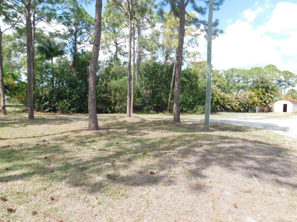 Photo of 11065 N 67th Place N, West Palm Beach, FL 33412 (MLS # B26000028)