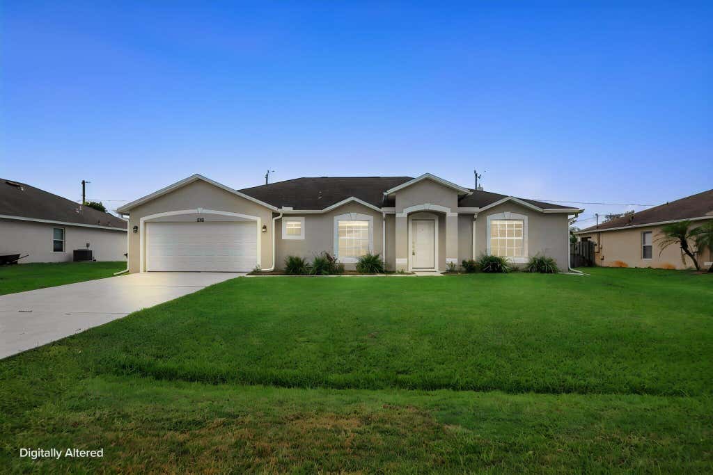 Photo of 216 SW Kestor Drive, Port Saint Lucie, FL 34953 (MLS # B26059428)