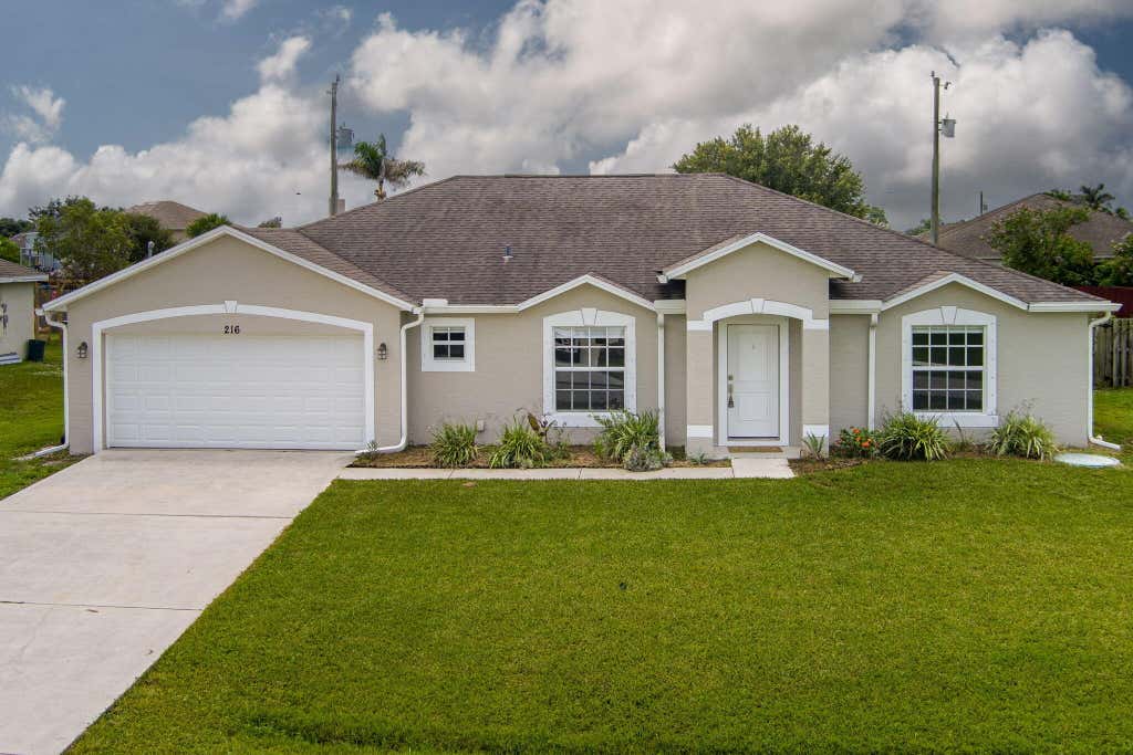 Photo of 216 SW Kestor Drive, Port Saint Lucie, FL 34953 (MLS # B26059428)