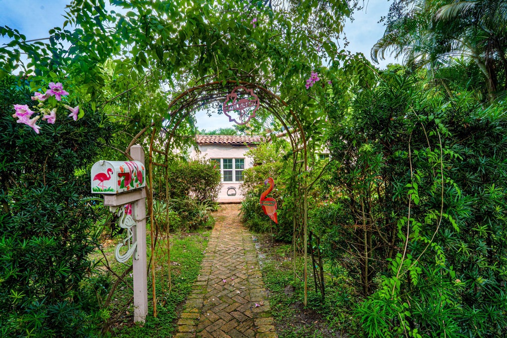 Photo of 703 Sunset Road, West Palm Beach, FL 33401 (MLS # B26083677)