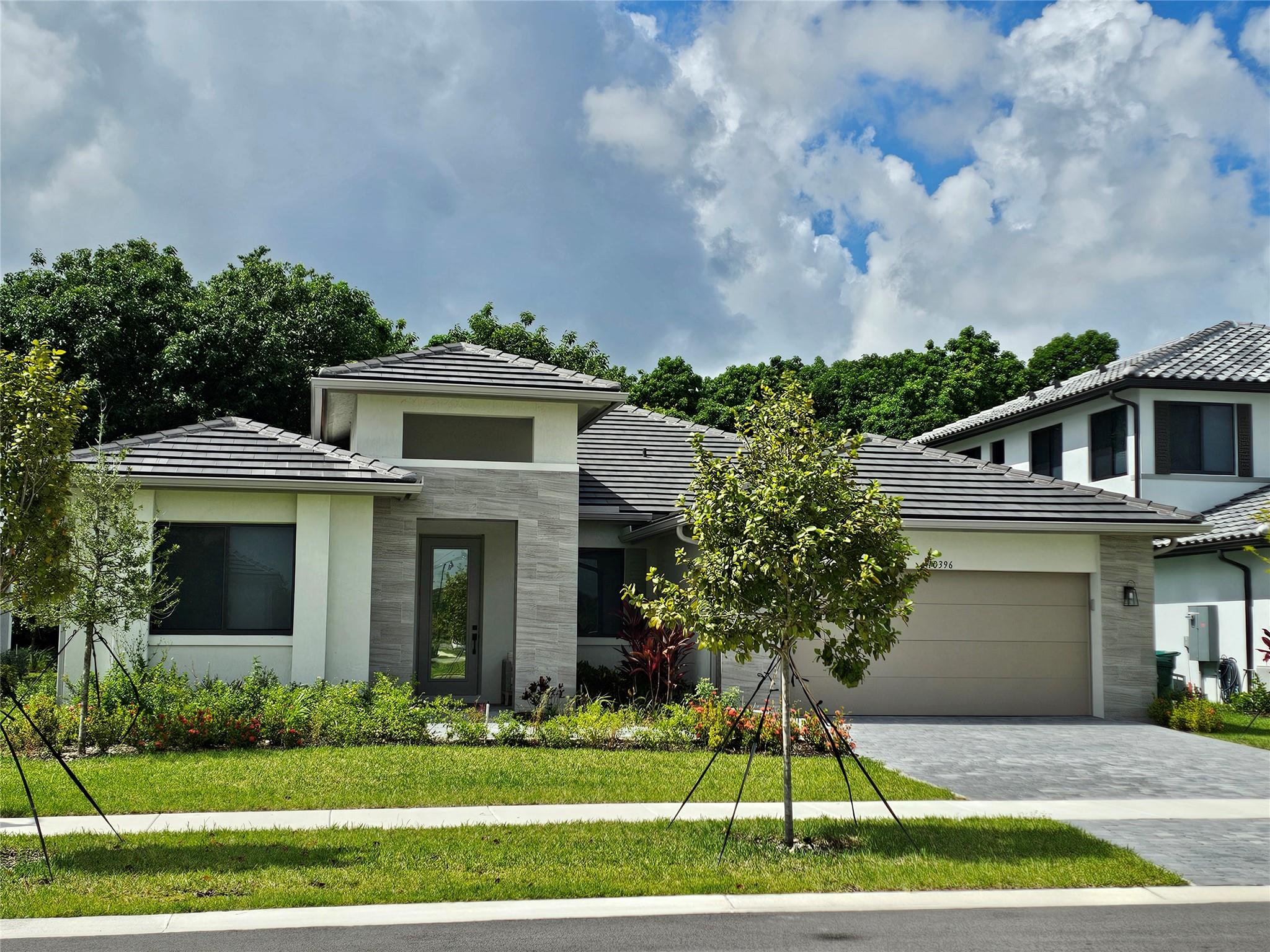 2023 New Construction, SMART HOME, gated Cooper City community. 4 bed 3 bath, ALL CERAMIC TILE FLOORS, 1 story, bright, modern, open concept design, that invites the sunshine in w volume ceilings, all impact windows and doors, kitchen w Euro style cabinets, convection oven plus microwave, quartz island w miles of storage and counter space. ACCESS TO COOPER CITY SCHOOLS & parks. This is the ONLY 1 story Fairway model currently listed for lease. Covered terrace, 2 car garage. Double walk in closets in owners suite. Come home to one of the newest gated communities in highly desirable Cooper City. Smart home features: oven, garage, ac have IP, Primary Suite blinds operate remotely, Partially FURNISHED as pictured include TV, sofa, bedrooms etc. Private back yard green space. DONT MISS THIS.