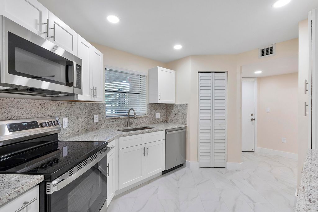 Photo of 6855 W Broward Boulevard #112, Plantation, FL 33317 (MLS # B26000713)