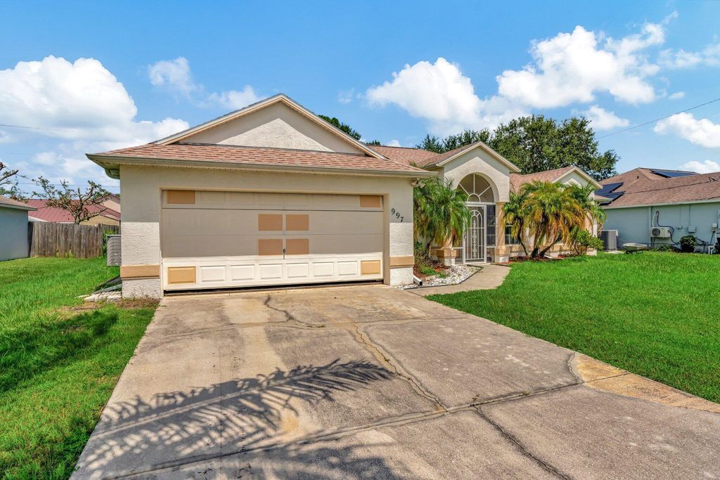 Photo of 997 SW Eureka Avenue, Port Saint Lucie, FL 34953 (MLS # R11019684)