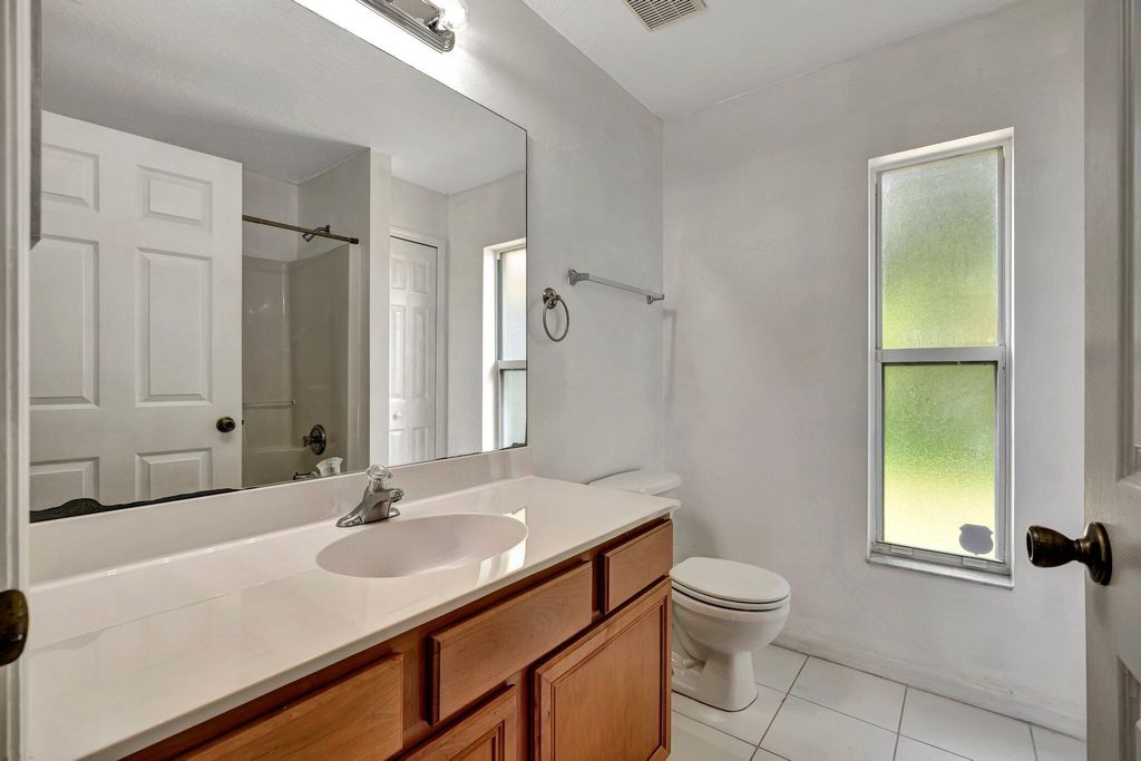 Photo of 997 SW Eureka Avenue, Port Saint Lucie, FL 34953 (MLS # R11019684)