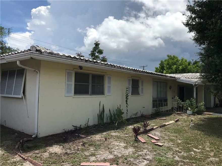 Clean 2/2 with a carport in coral ridge isles. Great flip opportunity or place to live. Home needs a new roof and complete remodel/upgrade. SOLD AS IS!
