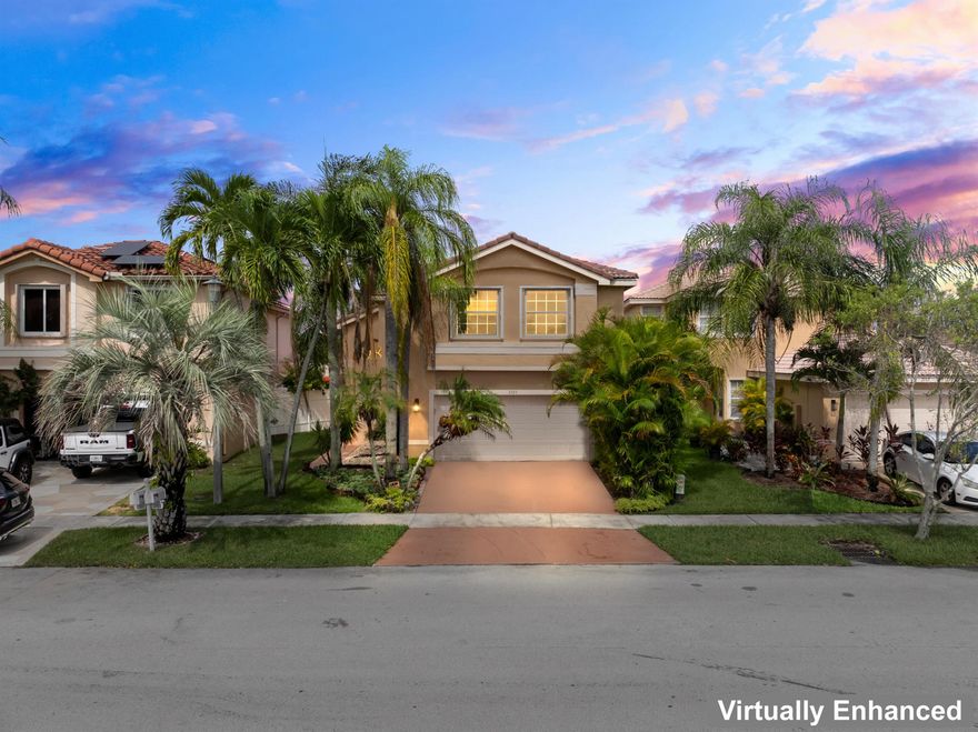 Fall in love with this Unique DREAM Home with Four bedrooms, 2 Full baths + Half bath nestled within the tree-lined community of the beautiful SAPPHIRE SHORES. This lovely home is set against the backdrop of OASIS Preserve w/ Lake views: A private Pool w/ outdoor shower, bask in the lake breeze or barbecue. New Garage door installed and *new shutters. The natural light throughout this home exudes serenity. Upon entering, floor-to-ceiling windows bathe the rooms in natural light, while framing breathtaking vistas of the Lake. Located a few minutes away from A Rated Schools, Parks, Hospitals & Boaters' Park. Community amenities: Club House, Pool, Tennis Ct. & Gym.  New This Single Family Home offers plenty of space by a nature sanctuary atop an unmatched site. Truly The Best MIRAMAR has to O