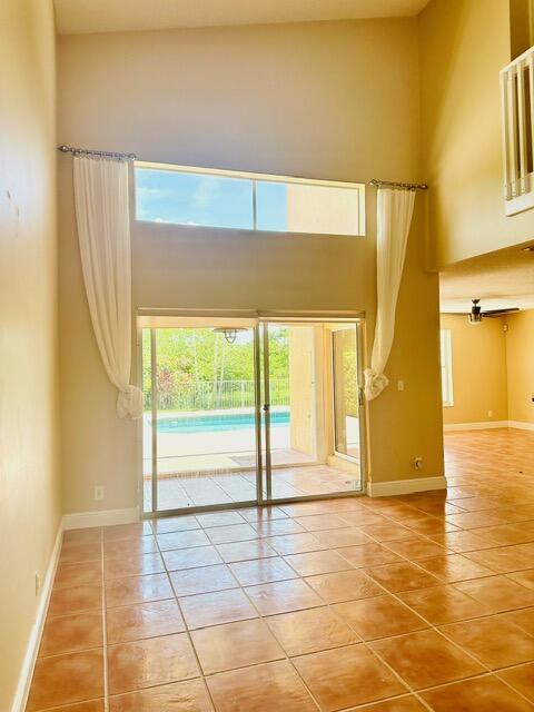 Fall in love with this Unique DREAM Home with Four bedrooms, 2 Full baths + Half bath nestled within the tree-lined community of Silver Lakes in the beautiful SAPPHIRE SHORES. This lovely home set against the backdrop of OASIS Preserve w/ Lake views: A private Pool w/ outdoor shower ideal to unwind, entertain, bask in the lake breeze or barbecue. The natural light throughout this home exudes serenity. Upon entering, floor-to-ceiling windows bathe the rooms in natural light, while framing breathtaking vistas of the Lake. Located a few minutes away from A Rated Schools, Parks, Hospitals & Boaters' Park. Community amenities: Club House, Pool, Tennis Ct. & Gym. This Single Family Home offers plenty of space by a nature sanctuary atop an unmatched site. Truly The Best MIRAMAR has to Offer!!