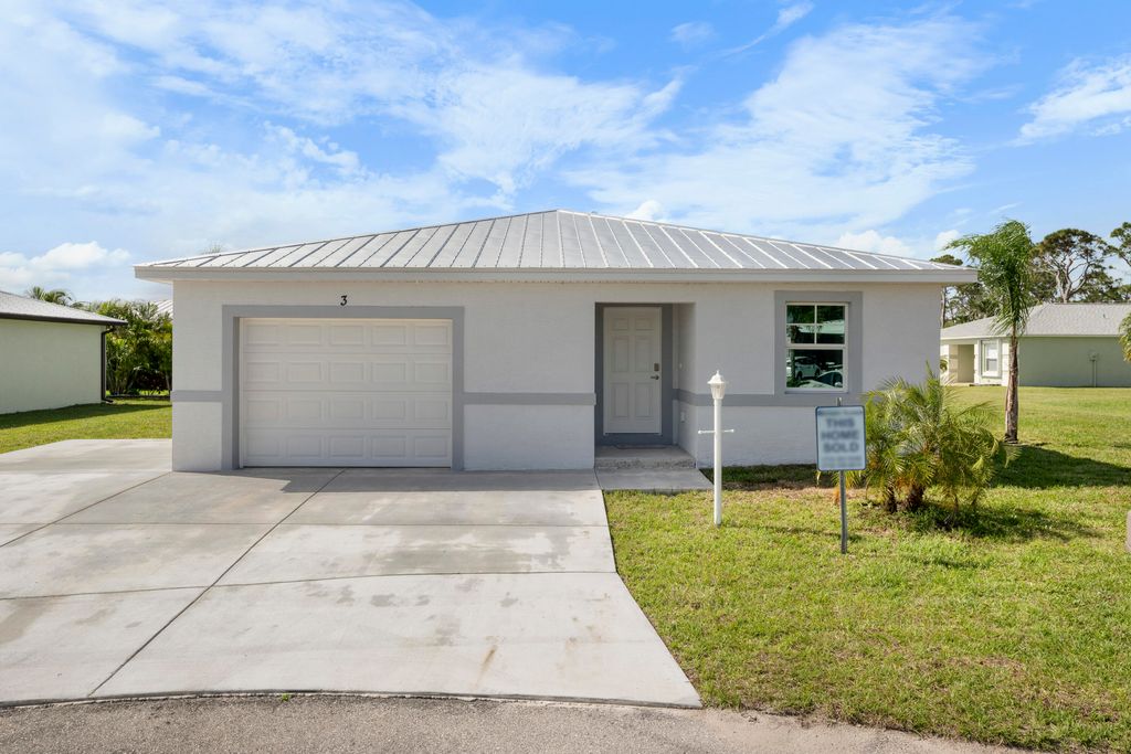 Photo of 9 Don Quixote Lane, Port Saint Lucie, FL 34952 (MLS # R11121933)
