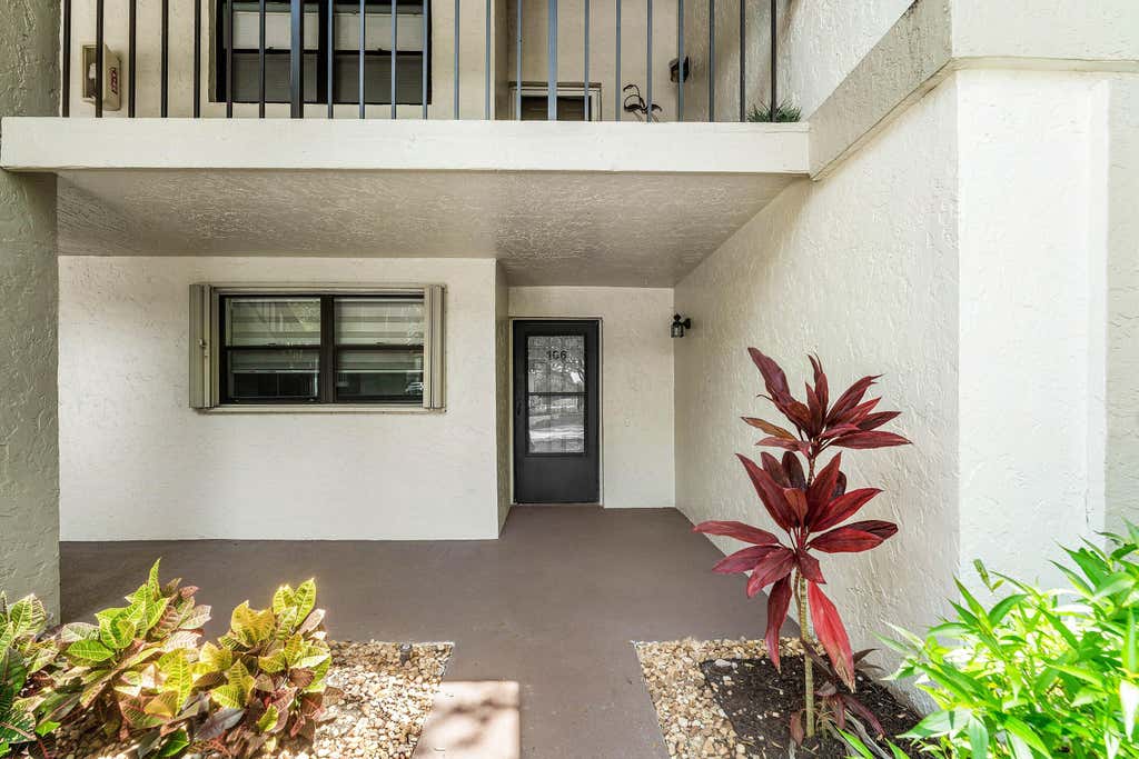 Photo of 12870 Briarlake Drive #106, Palm Beach Gardens, FL 33418 (MLS # B26065296)