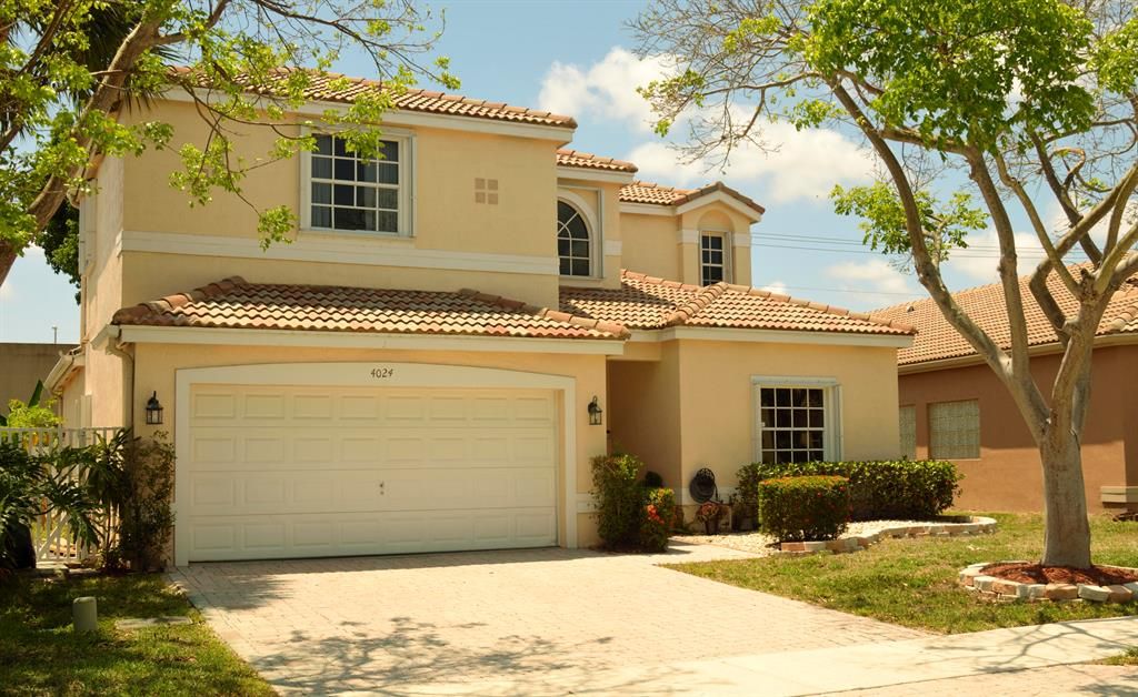 Photo of 4024 NW 62nd Court, Coconut Creek, FL 33073 (MLS # R10713517)