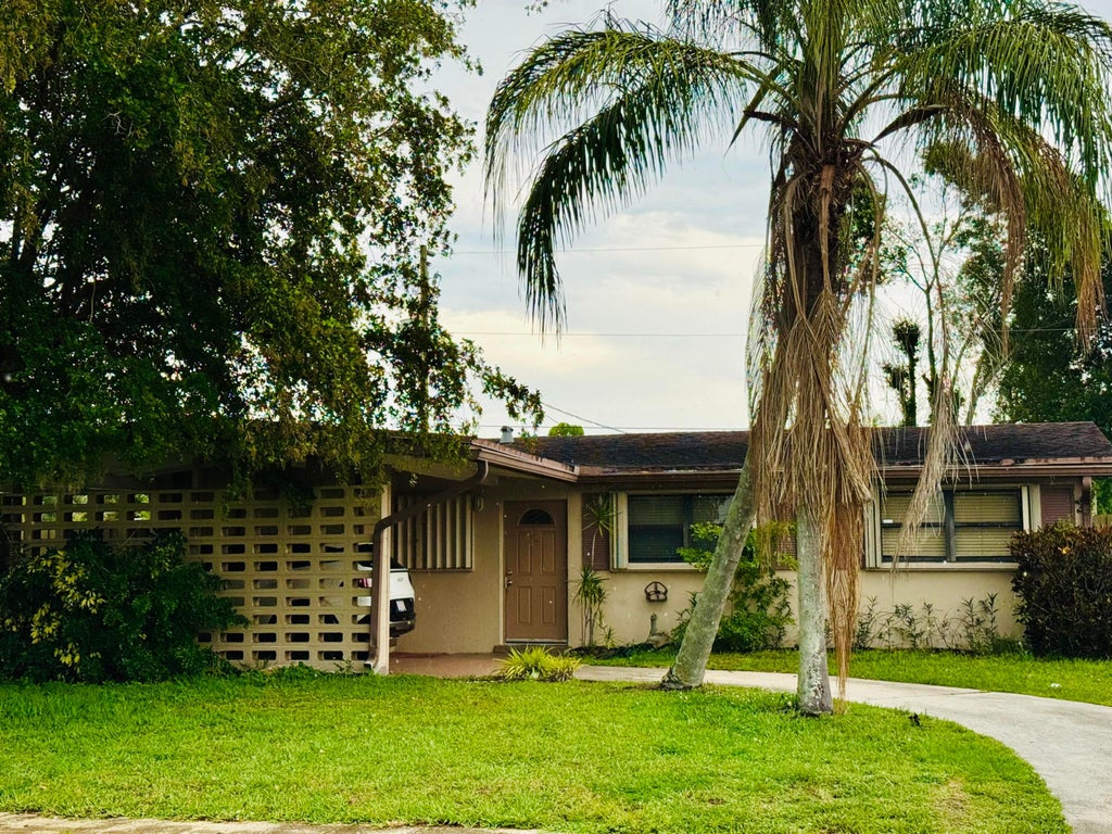 Photo of 764 Gardenia Drive, Royal Palm Beach, FL 33411 (MLS # B26025654)