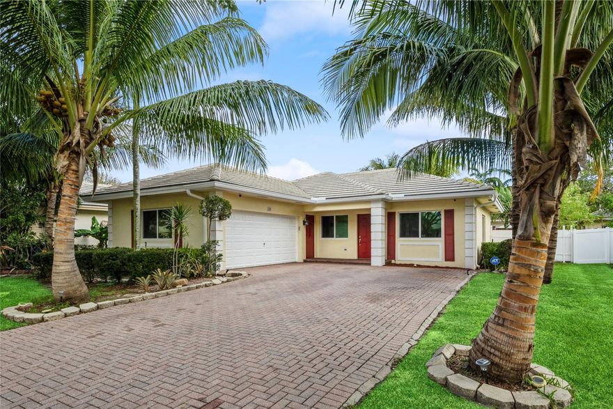Lovely 3 bedroom, 2 bath home with 2-car garage and fenced yard in a warm and friendly neighborhood in the heart of Pompano Beach. Only 15 minutes to the beach! Easy access to major highways and streets. Built in 2004. Features impact glass windows, tile floors with laminate in bedrooms, stainless steel appliances, new kitchen sink and disposal, paver driveway, and coconut trees. This cheery home has lots of natural light. The private backyard is great for entertaining or simply relaxing. HOA cuts the lawn. Neighborhood park nearby. A great place to call "home"!
