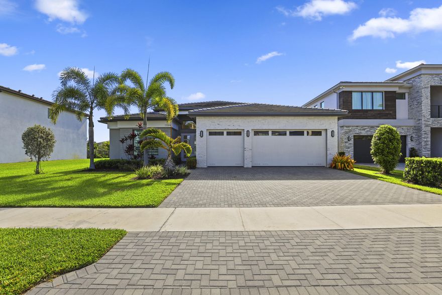 Discover elevated living in this meticulously upgraded 3 Bed | 3.5 Bath, with a Den Santo model, perfectly positioned on a premium lakefront lot in Lotus flagship luxury community. This single-story residence exudes modern warmth, showcasing rich hardwood flooring, sophisticated designer finishes, custom built-in closets, and a spacious 3-car garage. An effortless indoor-outdoor flow leads to a private pool with a cabana overlooking tranquil water views. Enjoy an expansive great room, upgraded kitchen, and a primary retreat designed for ultimate comfort. Having unrivaled amenities including a grand clubhouse, café, fitness center, tennis, pickleball, and a vibrant social calendar. A rare offering in a prime location luxury, lifestyle, and location combined.