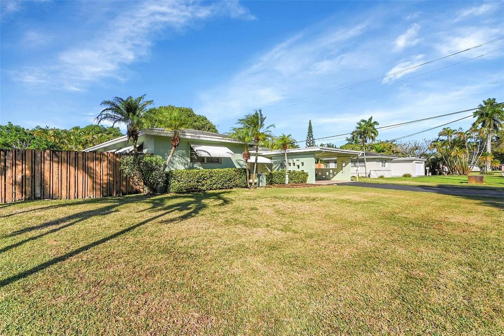 Photo of 881 NW Zinnia Lane, Plantation, FL 33317 (MLS # F10543982)