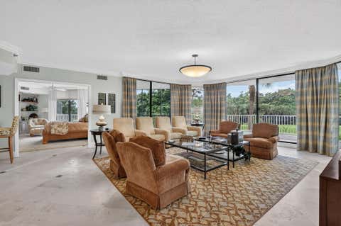 Photo of 20290 Fairway Oaks Drive #222, Boca Raton, FL 33434 (MLS # B26061409)