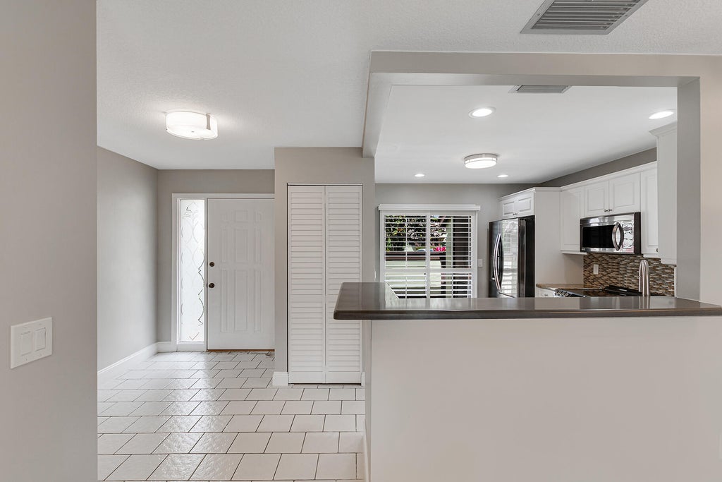 Photo of 423 NARROWLEAF Court, Royal Palm Beach, FL 33411 (MLS # B26074558)