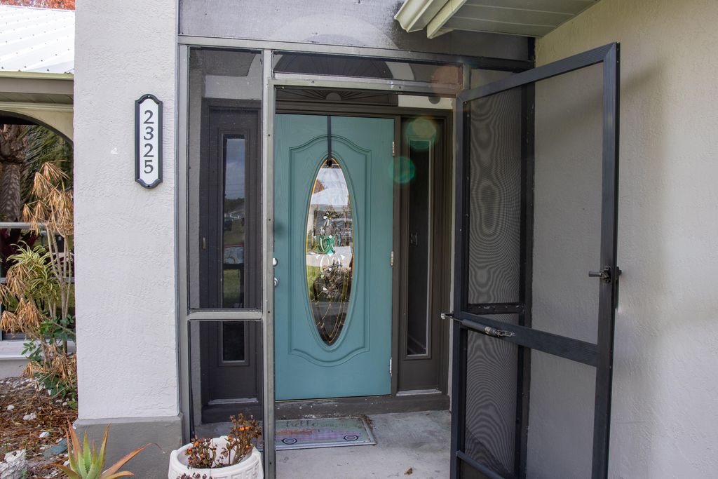 Photo of 2325 SE Beechwood Terrace, Port Saint Lucie, FL 34952 (MLS # B26002955)