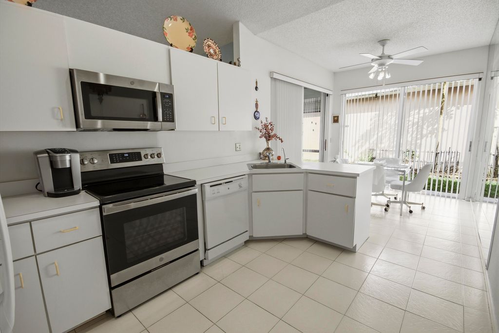 Photo of 7660 Kings Ride Rd, Boynton Beach, FL 33436 (MLS # R11169148)