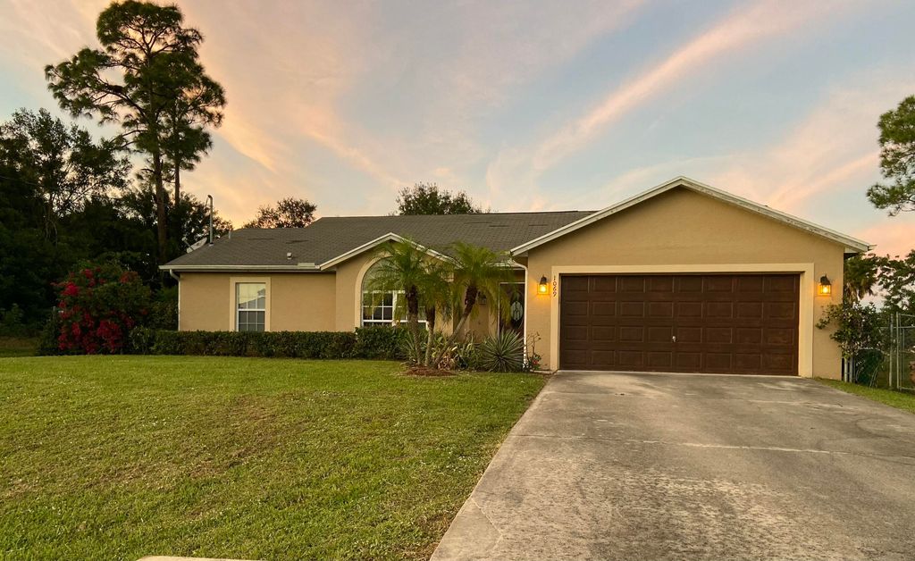 Photo of 1069 SW Jacqueline Avenue, Port Saint Lucie, FL 34953 (MLS # R11121704)