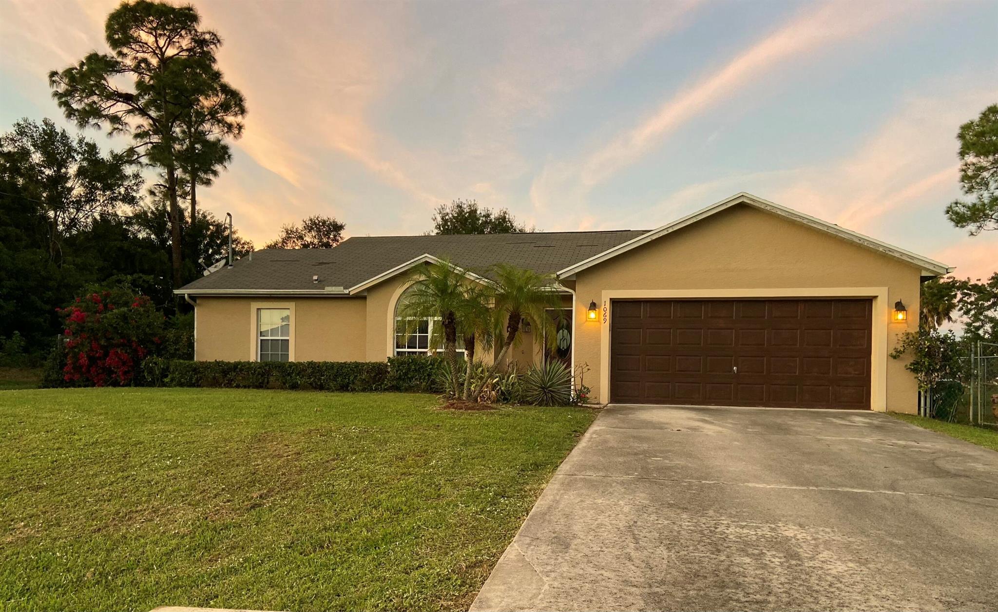 Single-family rental home featuring 3 bedrooms, 2 bathrooms, and a screened-in back porch. Spacious, grassed backyard. Lovely neighborhood. One-year lease, unfurnished. Washer & Dryer included. Two Car Garage & Driveway. Conveniently located near the Florida Turnpike, I-95, Tradition, and St. Lucie West.Lawn maintenance included.