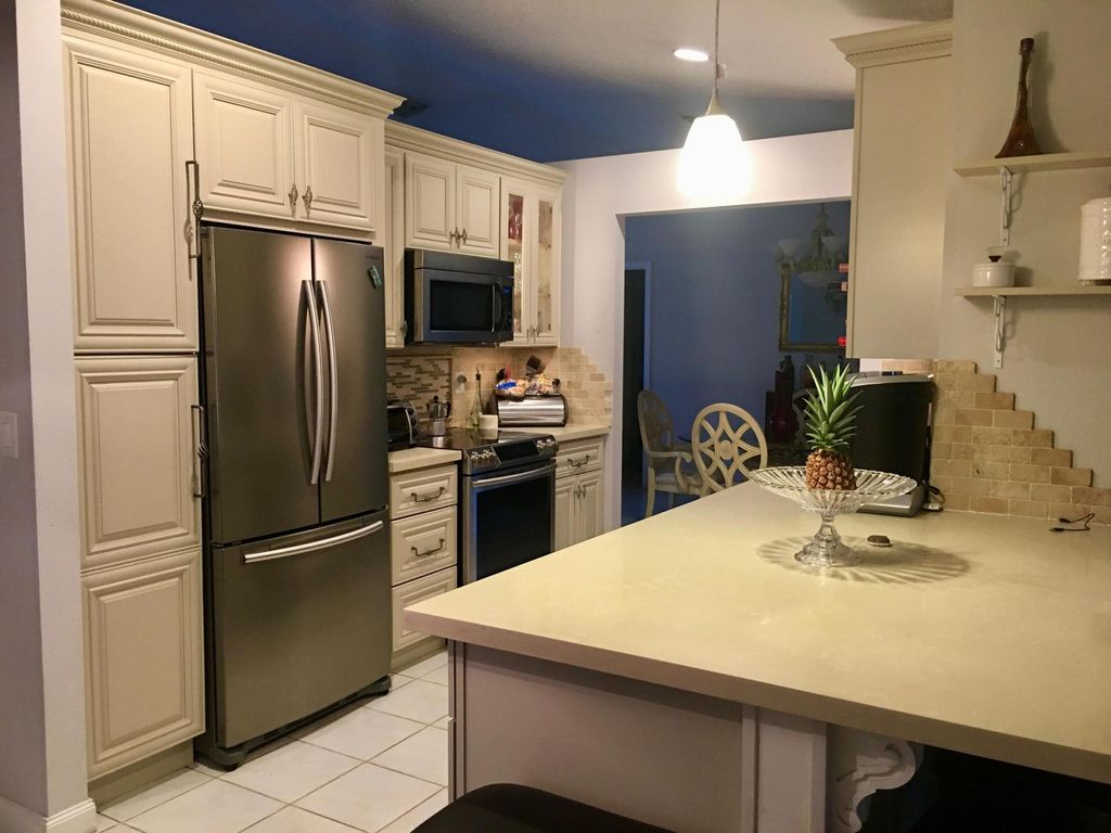 Photo of 1069 SW Jacqueline Avenue, Port Saint Lucie, FL 34953 (MLS # R11121704)