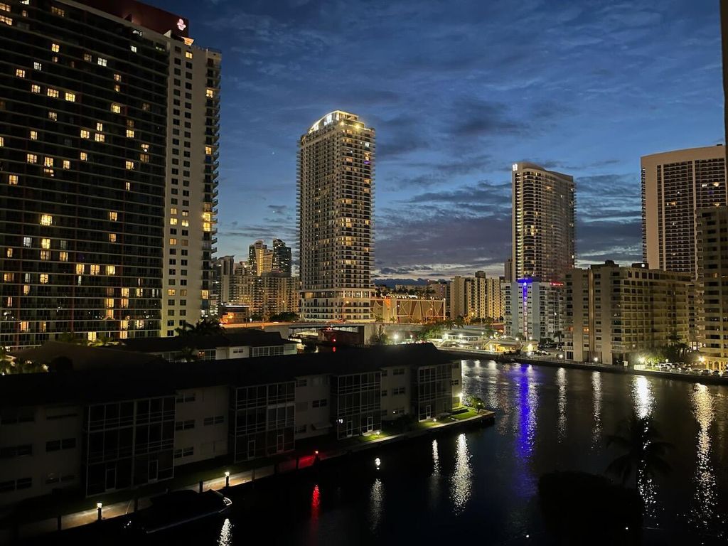 Photo of 100 Golden Isles Drive, Hallandale Beach, FL 33009 (MLS # B26021040)