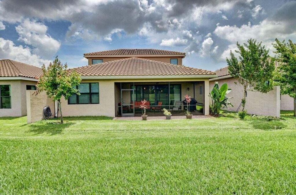 Photo of 14599 Alabaster Avenue, Delray Beach, FL 33446 (MLS # R10940066)
