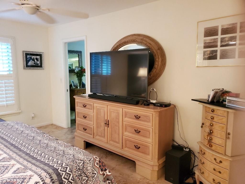 Photo of 5580 Tamberlane Cir #137, Palm Beach Gardens, FL 33418 (MLS # F10306671)