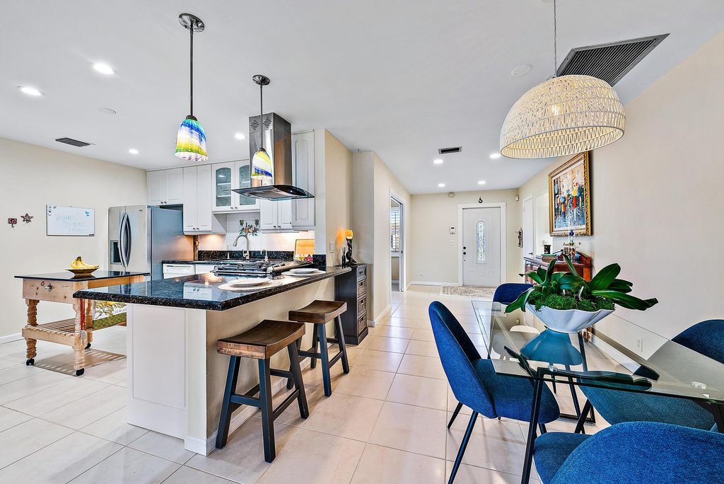 Photo of 445 Riverside Drive, Palm Beach Gardens, FL 33410 (MLS # R10956651)